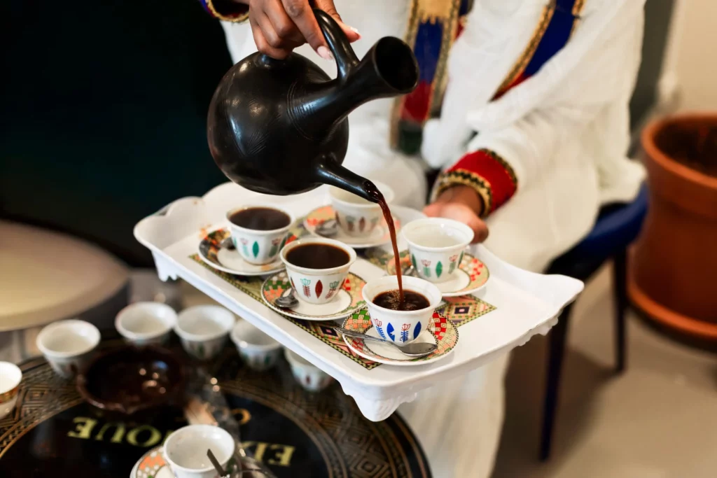 Traditional Ethiopian coffee ceremony at Abugida Restaurant in Neuchâtel-Peseux featuring authentic Habesha coffee service and cultural hospitality