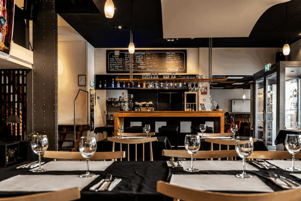 Modern and welcoming dining room at Abyssinia Restaurant Neuchâtel featuring comfortable seating and a warm multicultural atmosphere