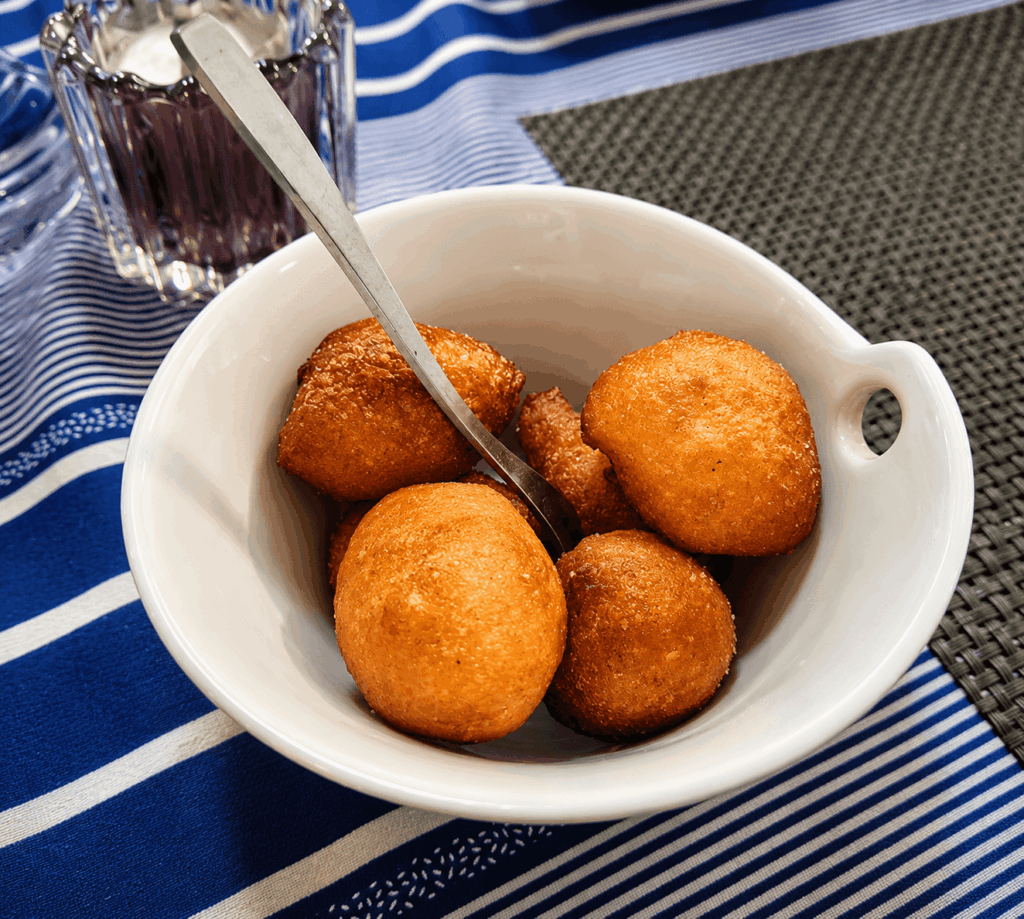 Traditional African beignets served at La Couronne d’Or restaurant Geneva