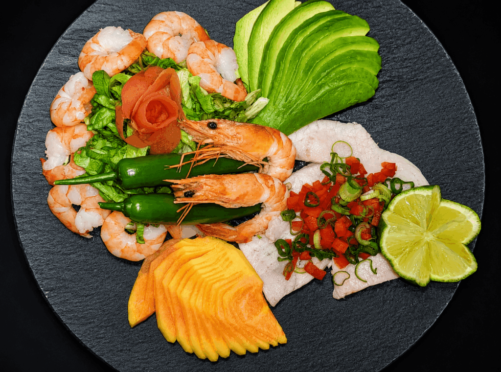 Fresh seafood, avocado, shrimp, and tropical salad at Le Palmarin Geneva