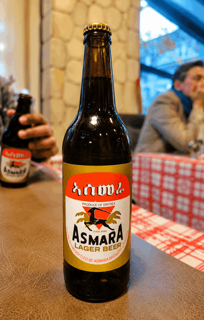 Bottle of Asmara Eritrean lager beer served at Mesob Ethiopian and Eritrean restaurant in Zürich