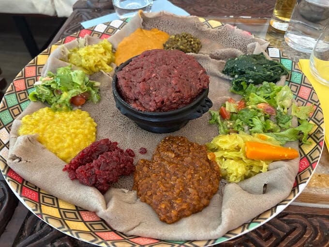 Traditional Ethiopian injera platter served at Awash restaurant in Geneva