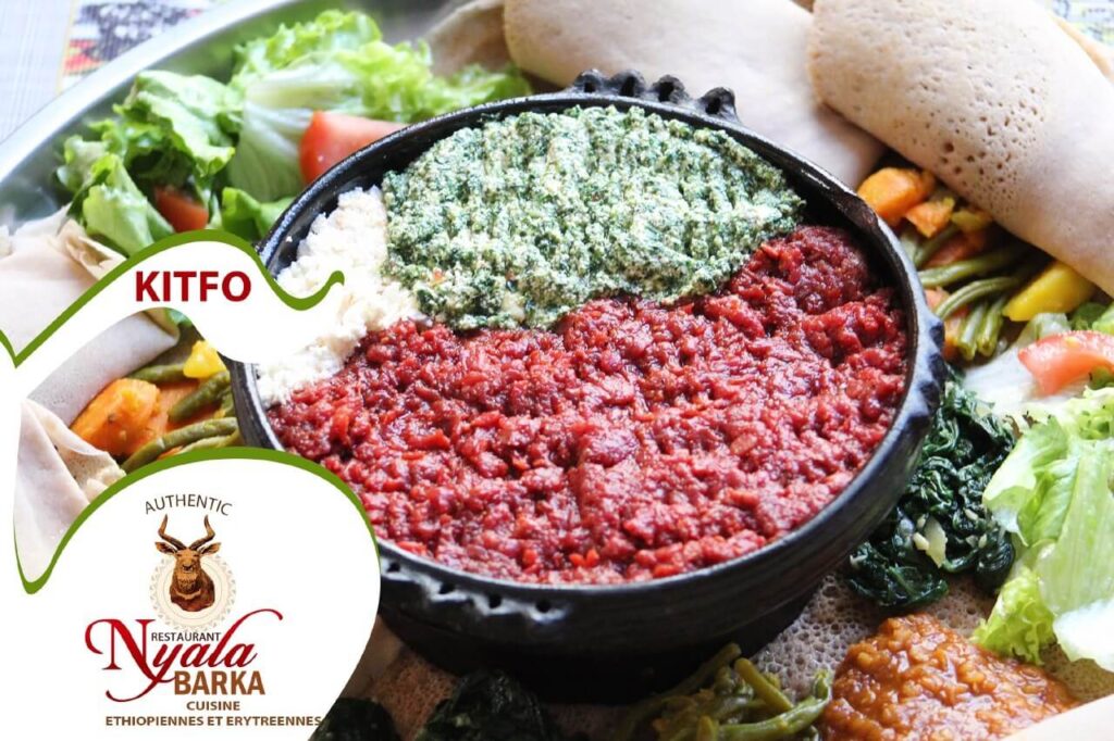 Traditional Ethiopian kitfo with injera at Nyala Barka Geneva