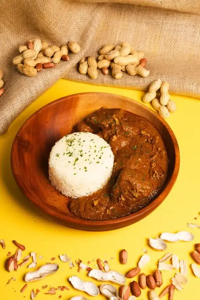 Traditional Ivorian sauce graine served with white rice at Afrogood African restaurant Lausanne
