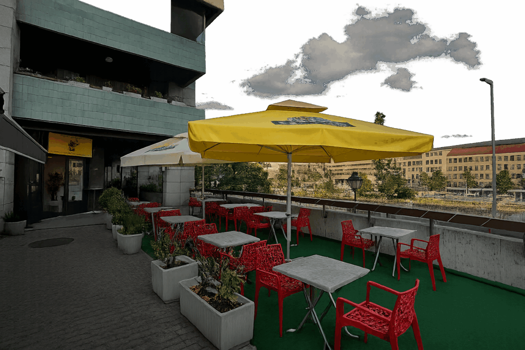 Outdoor terrace seating at La Couronne d’Or African restaurant Geneva