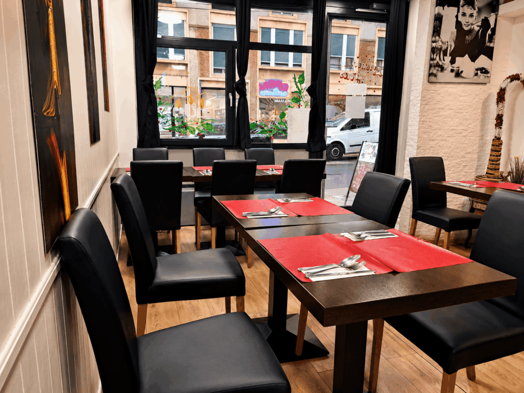Modern dining area inside La Teranga Senegalese restaurant in Geneva with elegant seating and warm ambiance