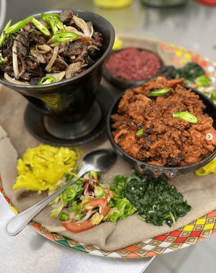Grilled Ethiopian and Eritrean meat specialties served with injera and traditional side dishes at Mercato Restaurant