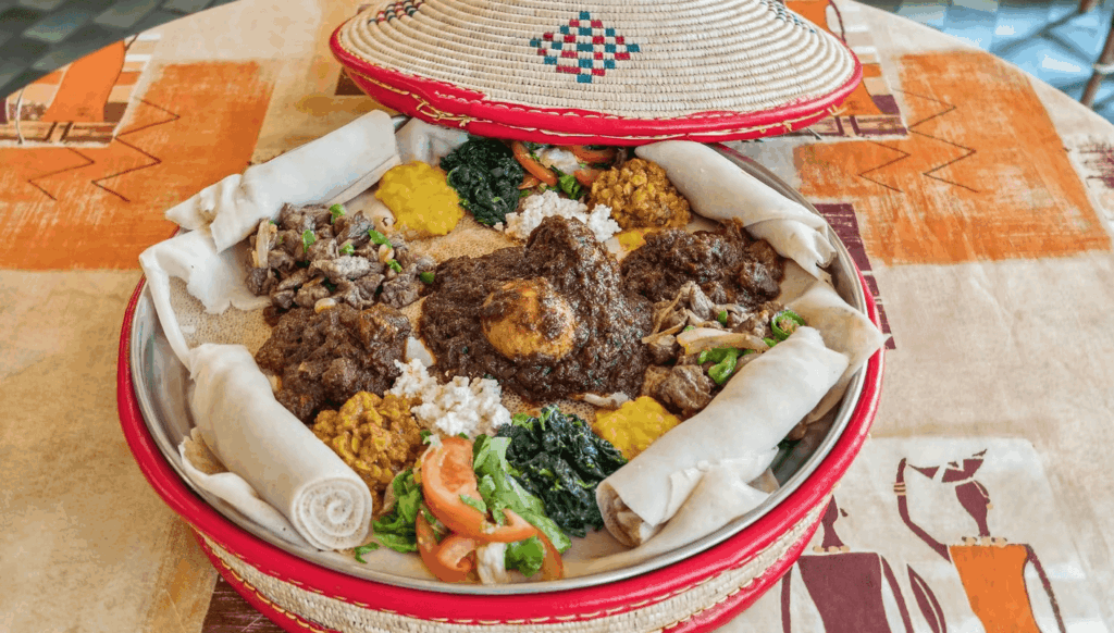 Traditional Ethiopian injera platter served at Restaurant Meskerem Geneva
