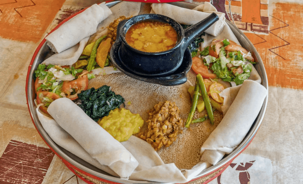 Traditional vegetarian Ethiopian dishes with injera at Restaurant Meskerem Geneva
