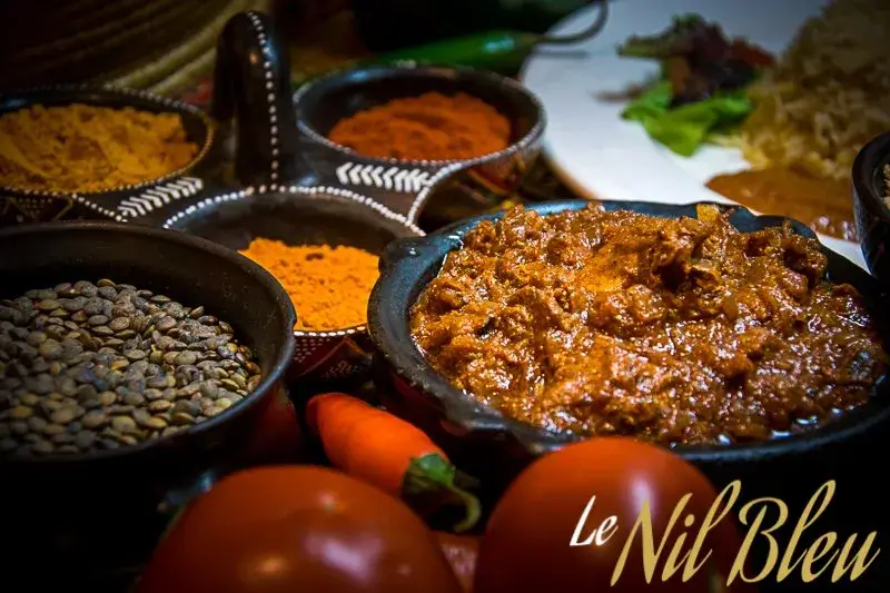 Traditional Ethiopian lamb stew with aromatic spices served at Nil Bleu Ethiopian restaurant in Lausanne