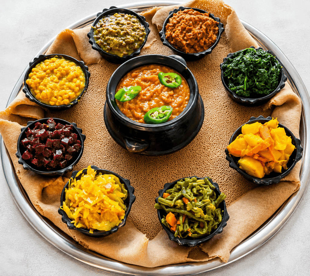 Ethiopian and Eritrean vegetarian platter with injera, lentils, spinach, and traditional East African dishes at Red Sea Restaurant Habesha