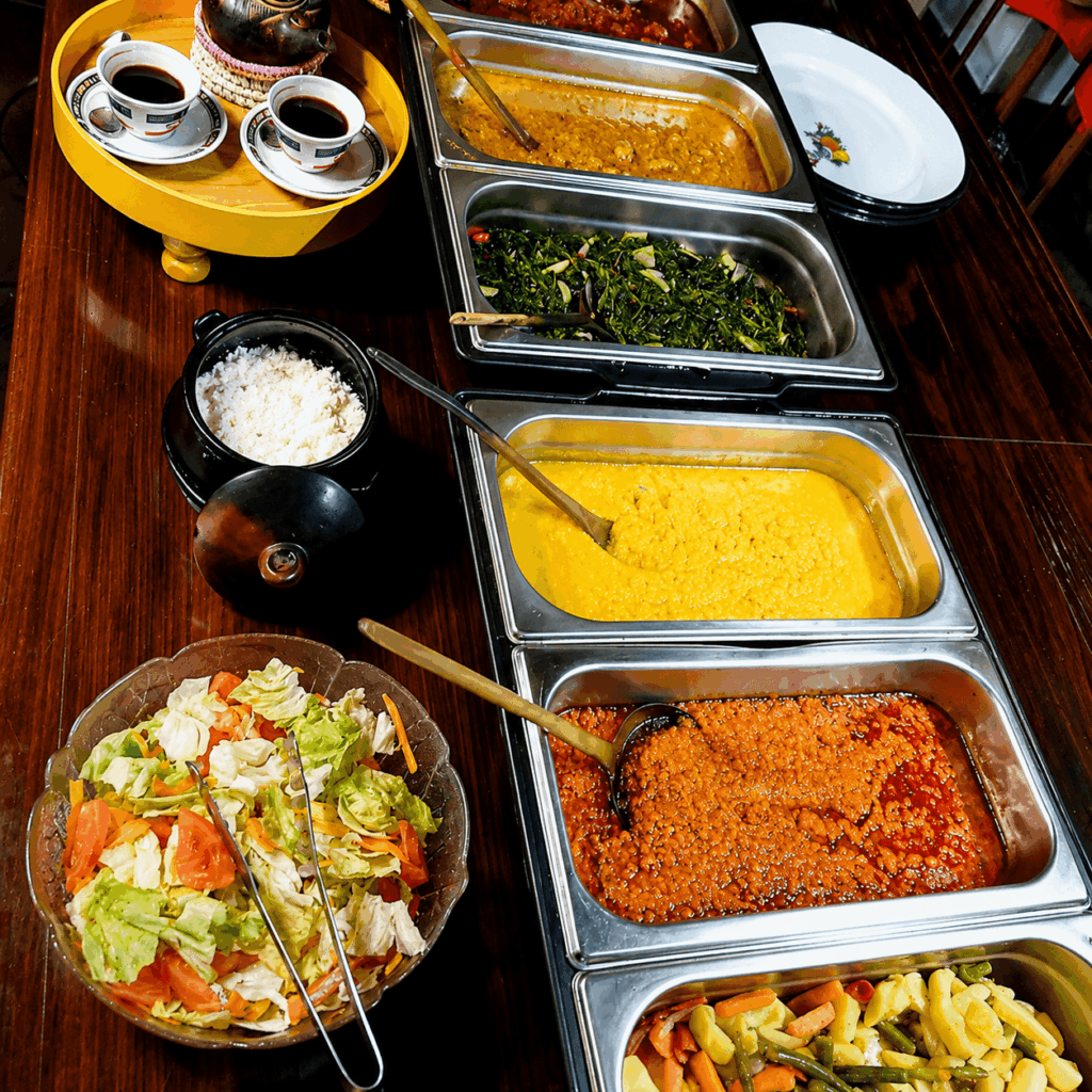 Traditional Ethiopian coffee ceremony and buffet featuring authentic Eritrean and Ethiopian dishes prepared with fresh ingredients and aromatic spices at Restaurant Marathon
