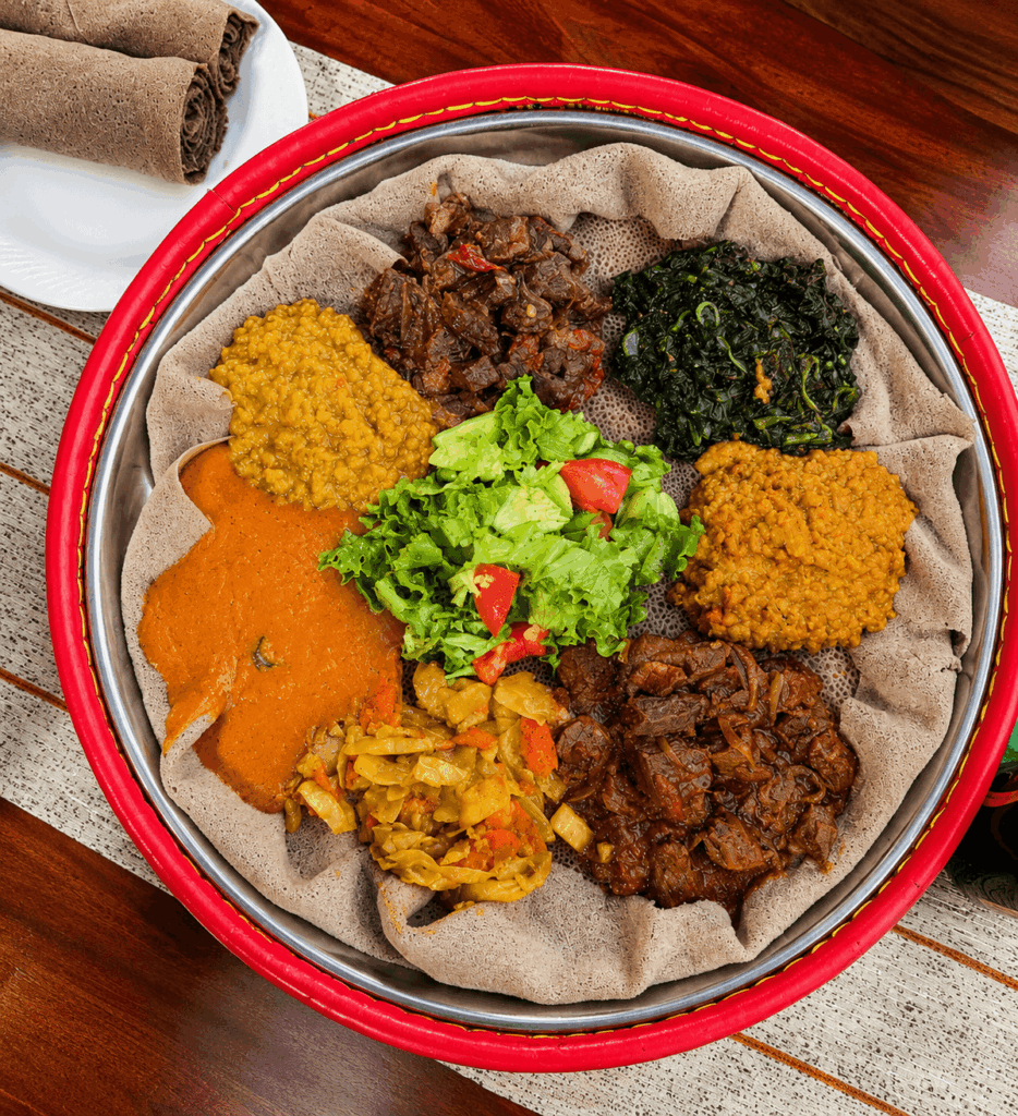 Traditional Habesha sharing platter with Ethiopian and Eritrean specialties at Senay Restaurant in Aarau