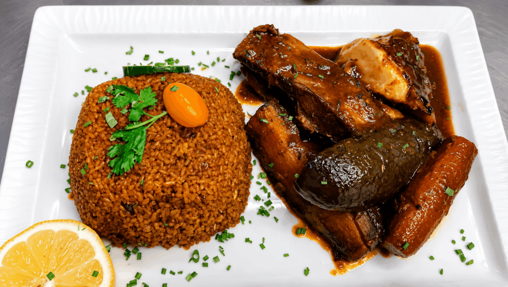 Traditional Senegalese rice dish with meat and vegetables at Rio Fresco Geneva
