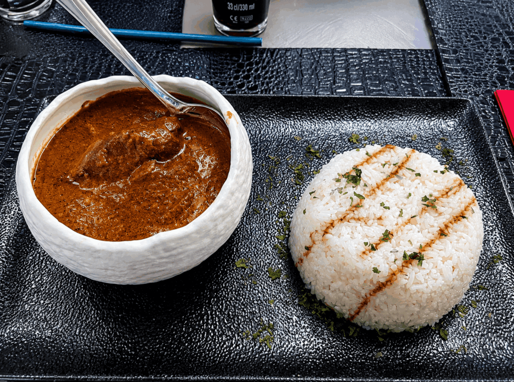 Traditional Senegalese sauce served with white rice at Le Palmarin restaurant Geneva