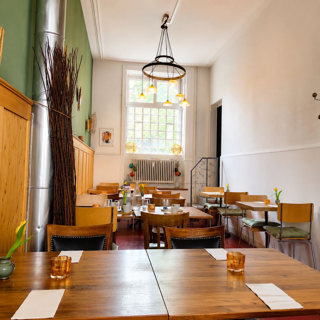 Elegant dining room at Shiro Basel featuring a warm atmosphere, contemporary design, and authentic Ethiopian and Eritrean hospitality in Kleinbasel