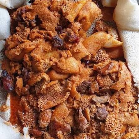 Firfir be Tibs Ethiopian injera firfir with tibs at Addis Abeba Restaurant Geneva